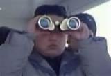 image of Kim Jong-un with binoculars