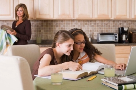 image of children online in kitchen